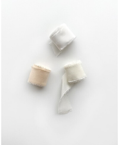 Cintas de seda gama de colores blancos