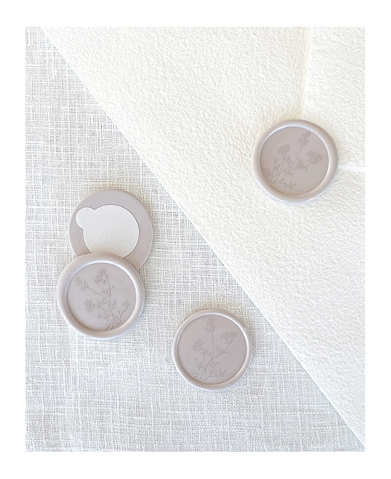 Sealed stamps with wildflower sticker