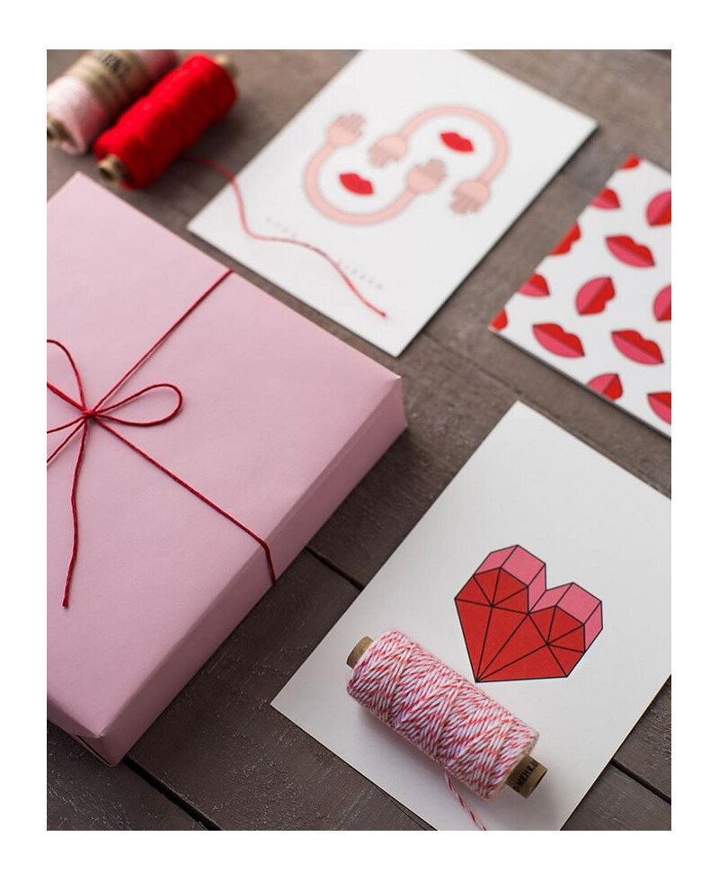 Ficelle rouge et blanche pour emballer les cadeaux